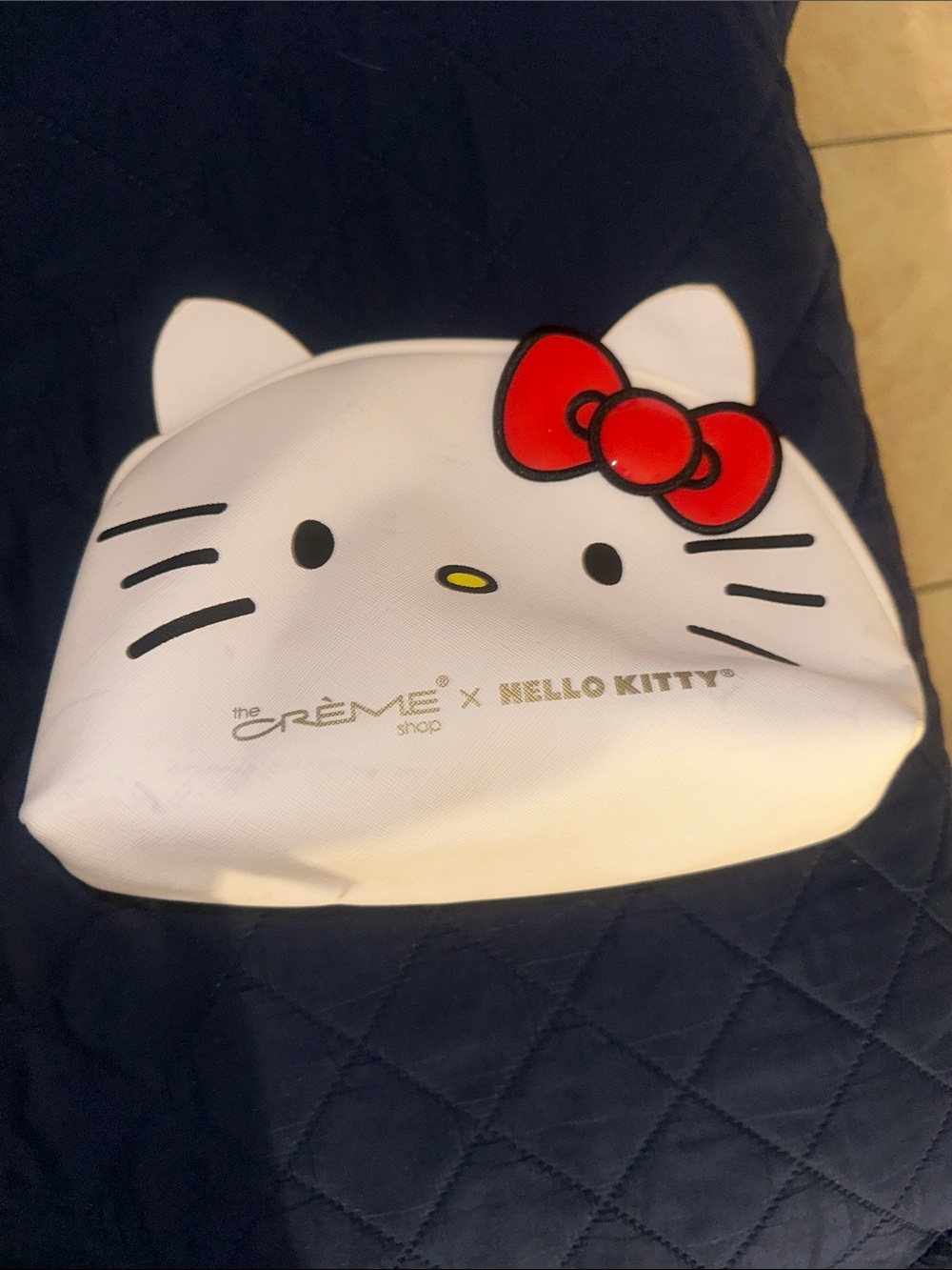 The Crème Shop x Hello Kitty White Cosmetic Pouch with Red Bow Accent Make Up